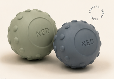 A champagne-sage and sea-glass blue tactile NED companion.